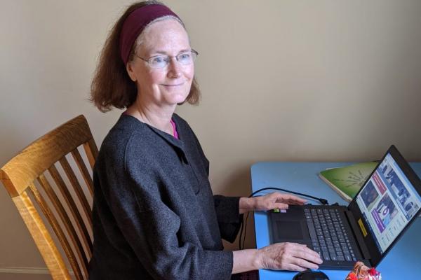 Anne Harrop working at her desk from her home in York.