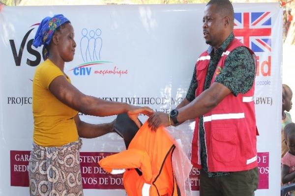 Life jackets being handed out