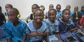 Children using tablet computers on the VSO Malawi Unlocking Talent project 