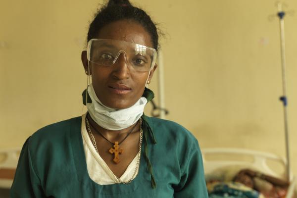 Hospital worker Ngisti helps to keep the wards clean in the neonatal worker
